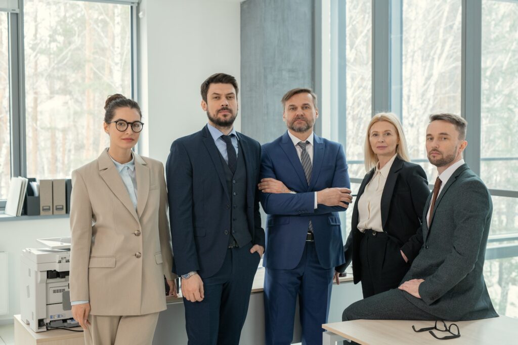 Team of confident lawyers in office